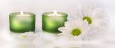 Candles and white spring flowers - relaxing time