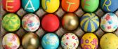 A box of colored eggs - Message: Happy Easter