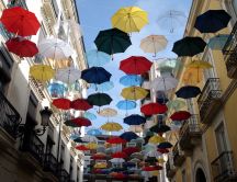 Umbrellas placed on a wire to dry