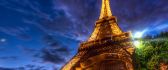 Eiffel Tower illuminated at night - HD wallpaper
