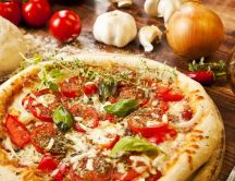 Delicious italian pizza - tomatoes and mozzarella