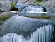 Cool and refreshing water of a waterfall - nature wallpaper