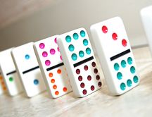 Domino game with colorful pieces