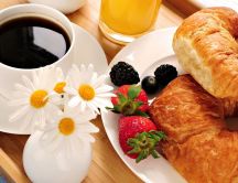Black coffee, fruits and croissant - perfect breakfast