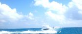 Speed boat making waves on the sea - summer holiday