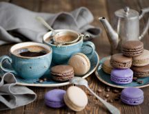 Hot coffee and delicious macarons - perfect breakfast