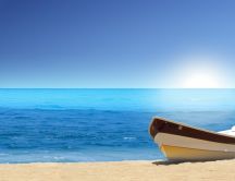 Boat on the beach - beautiful blue sea