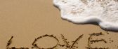 Love message on the beach - see foam