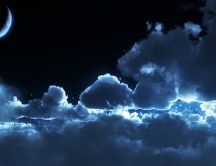 Big fluffy clouds in the dark night