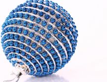 Fir globe with many blue balls