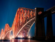 The Forth Bridge Edinburgh lit in the night