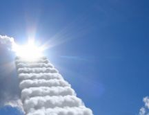 Stairs made of clouds up the sunshine in the sky