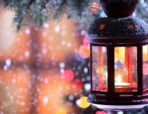 A candle through the snowflakes - Winter time
