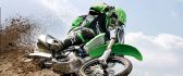 Green Kawasaki Motocross in the sand