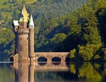 The Vyrnwy Tower on lake water