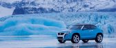 Beautiful blue Volkswagen car on the ice - winter wallpaper