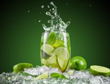 Splash - lime slice and mint in a glass of water
