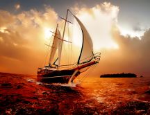 Boat on the ocean in the sunset - wonderful colors