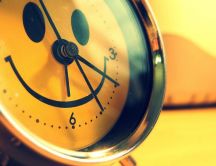 Happy smiley face on a clock - Good morning