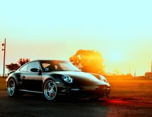Black Porsche in the sunset - HD auto wallpaper