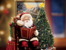 Santa Claus reading the Christmas Book near the magic tree