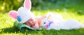Little baby boy and sweet white rabbit - Happy Easter