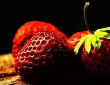 Bulb light over the strawberries - Delicious fruits
