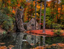 Olt water mill in the forest - Mirror in the lake