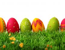 Beautiful colorful Easter eggs in the grass - Happy Holiday
