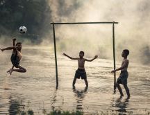 Playing football in the water - Jump action goal score point