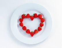 Sweet strawberry heart in a white plate - Valentines day