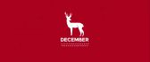 White reindeer on a red background - Christmas time December