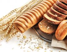 Ears of wheat and delicious bread with seeds - HD wallpaper