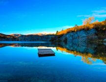 Wooden pontoon in the middle of a mountain lake - Nature