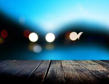 Car lights in the back -Wooden pontoon in front HD wallpaper